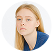 Young woman with blonde hair looking thoughtfully.